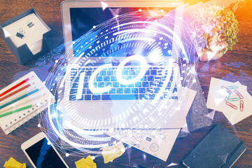 Double exposure of blockchain theme hologram and table with computer background. Concept of bitcoin crypto currency.