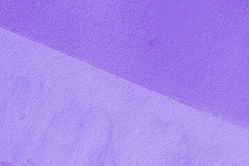 Fototapeta premium Texture of lilac plaster. Interior of a modern loft. Abstract rough background. The facade of an old house.