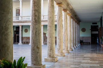 corridor of the old building. long corridor with stone columns
