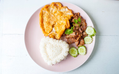 Fried Pork with Garlic Pepper Rice and Omelette, Popular Thai Food