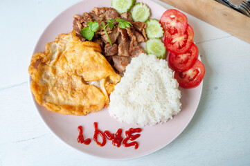 Fried Pork with Garlic Pepper Rice and Omelette, Popular Thai Food