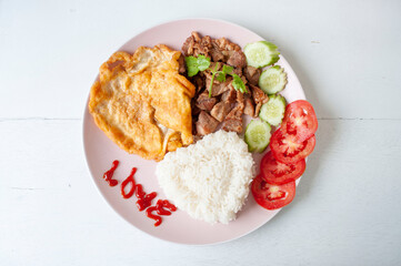 Fried Pork with Garlic Pepper Rice and Omelette, Popular Thai Food