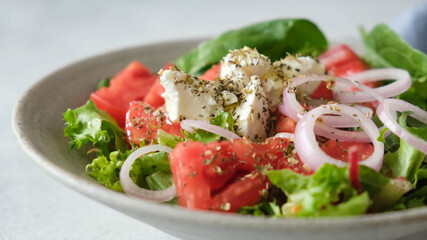 Greek salad with feta cheese in a bowl