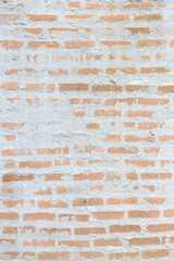 orange brick in white concrete or cement wall texture background