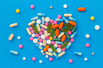 A lot of colorful medication pills drugs, top view