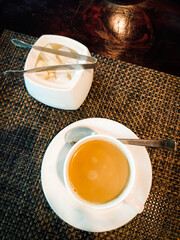 Cup of tea & sugar cubes