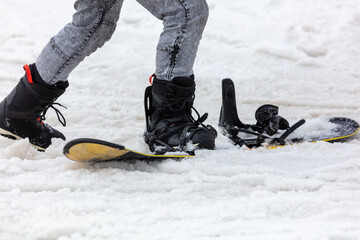 Snowboarder rides in the snow.