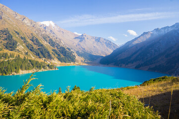 Alpine lake with the purest water. Mountains and lake. Big Almaty lake.