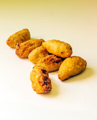 Croquettes surrounded by white background