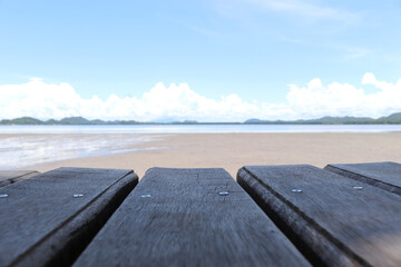 Empty old wooden vintage wooden in front of tidal current the sea, mountain and blue sky...