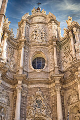 Fototapeta na wymiar Baroque style sculptural facade detail of the cathedral of Valencia, Spain