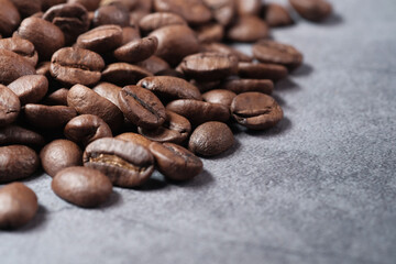 fresh coffee beans on black background with copy space.
