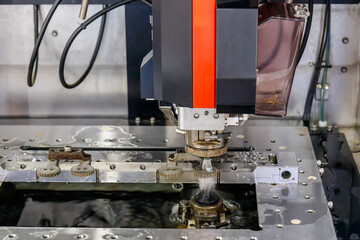 CNC wire cut machine cutting high precision mold parts