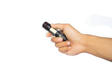 Male hand holds a black metal flashlight on white background