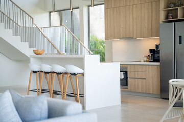 Interior design of pool villa, house, home, condo and apartment feature round stool, kitchen counter and kitchenette