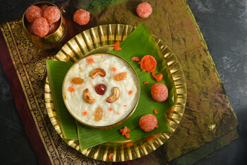 Diwali or Onam festival sweet food vermicelli Kheer, Semiya payasam Indian sweet Mithai with condensed milk in golden bowl for Dusshera, holi, Ramadan North India. dessert of Kerala Onam Sadhya, Vishu