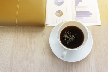 Close up of a coffee mug Placed on the desk.