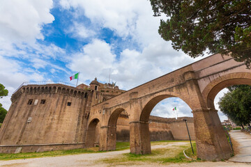 Obraz premium The Mausoleum of Hadrian, usually known as Castel Sant Angelo (English: Castle of the Holy Angel). Towering cylindrical building in Parco Adriano, Rome, Italy.