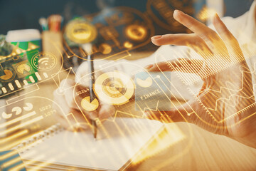 Tech theme hologram over woman's hands taking notes background. Concept of hightech. Double exposure