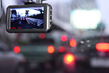 The car camcorder is recording traffic