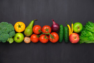 Healthy eating ingredients: fresh vegetables, fruits and superfood. Concrete background