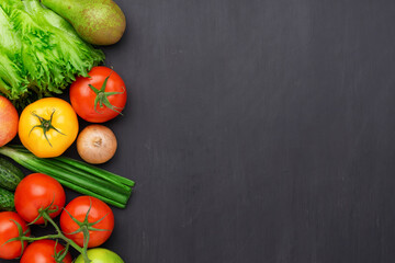 Healthy eating ingredients: fresh vegetables, fruits and superfood. Concrete background