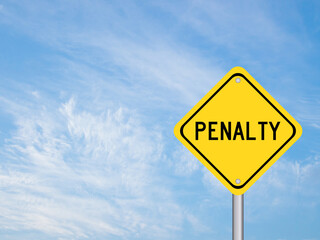 Yellow color transportation sign with word penalty on blue cloud sky background