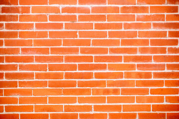 Red brick wall texture. A real photograph of the even brick wall.