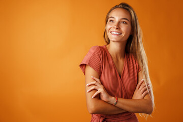 Obraz premium Portrait of a young beautiful happy woman smiling