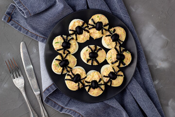 Deviled Eggs With A Spider For Halloween Party.