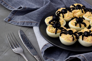 Deviled Eggs With A Spider For Halloween Party.