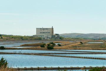 Old Saline salt factory on island Pag. Producing traditional salt from sea water.