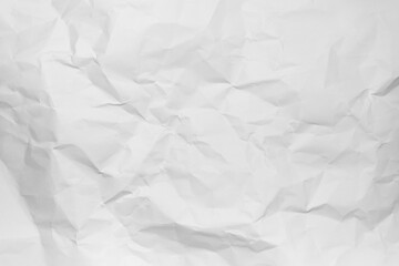 White crumpled paper texture background.