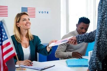 People voting in polling place, usa elections and coronavirus.