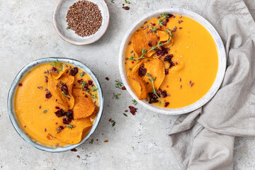Bowl of fresh sweet potato soup. Top view