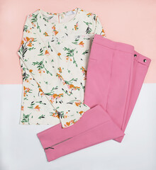 Casual woman dress flower style shirt and a pink pants top view