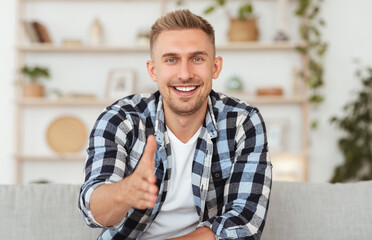 Confident Man Giving Hand For Handshake At Camera