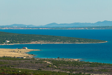 Fototapeta na wymiar Adriatic sea shore in Croatia, view of Pag island shore.