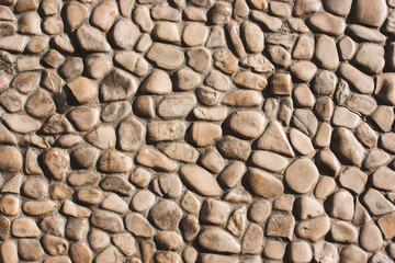 Background from brown small rounded stones.