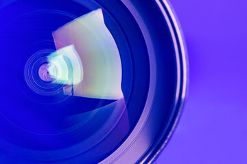 The camera lens with purple backlight. Optics.