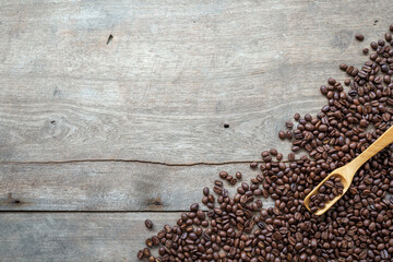 coffee beans on wooden floor background. top view