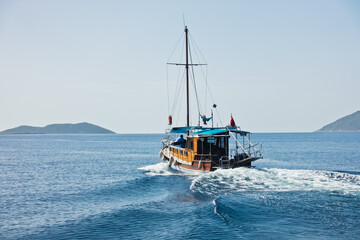 Sunny day at sea, boat is heading to Kekova island, near city of Kas, Turkey
