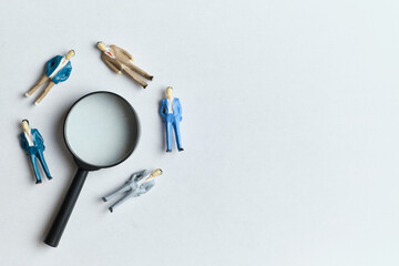 New employee search concept for work with magnifying glass and copy space