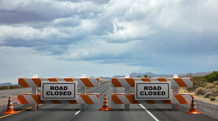Closed road sign, street barriers and traffic cones on empty highway, cloudy sky background.  3d illustration