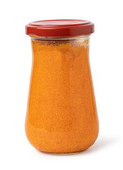 red basil pesto sauce in glass jar