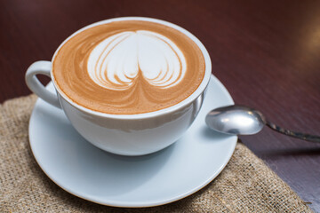 Delicious, aromatic and freshly made cappuccino with a pattern