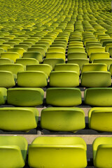 Fototapeta premium endless rows of enpty chairs in a stadium