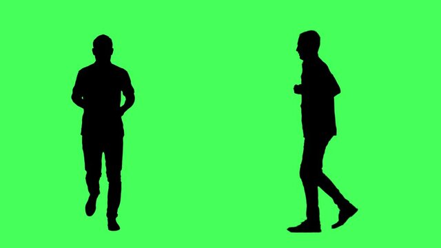 Silhouettes of business man running late. Front and side view. Full body on green screen chroma key background.