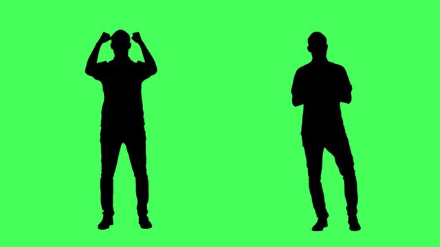 Silhouettes of male fan or supported cheering and rooting. Full body on green screen chroma key background.
