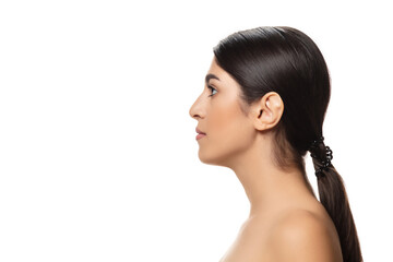 Obraz premium Calm. Portrait of beautiful jewish woman isolated on white studio background. Beauty, fashion, skincare, cosmetics concept. Copyspace for ad. Well-kept skin and natural fresh look. Healthy and shiny.